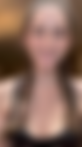 Topless real hiccups in french braids doing my makeup.