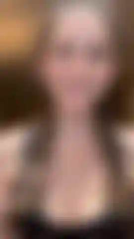 Topless real hiccups in french braids doing my makeup.