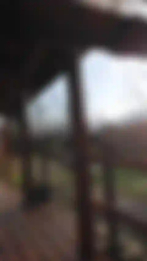 Hubby's sexy ass outside smells the flowers