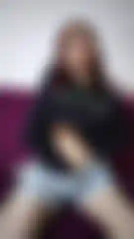 "Watch me as I slowly suck on my fingers, savoring them with desire... my hands squeeze and caress my breasts, showing them off just for you. Do you want more?"